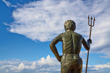The sculpture of the god Neptune's skyline. View from the back.