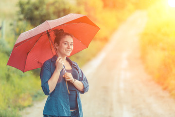 Teenage Girl with Red Umbrella