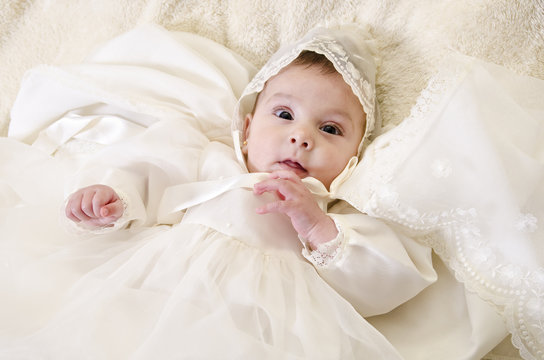 Little Baby With Ceremonial Baptism Clothes