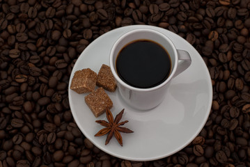 Cup of coffee with beans