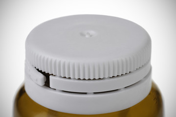 Top of small bottle with drug
