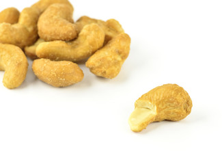 salted cashew nuts on white background