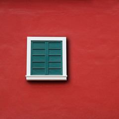 window and red wall