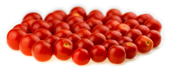 Juicy cherry tomatoes isolated against a white background