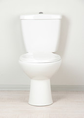 White toilet bowl in a bathroom