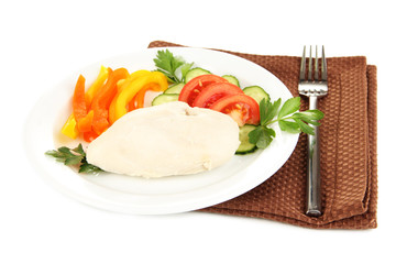 Boiled chicken breast on plate with vegetables isolated on