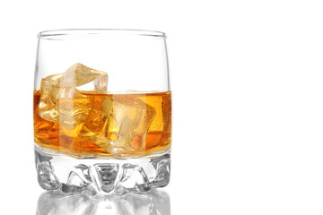 Brandy glass with ice isolated on white