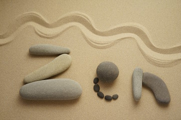 Fototapeta na wymiar Zen Schriftbild aus Steinen