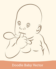 baby with a spoon