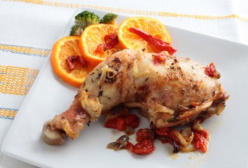 roasted chicken leg with oranges for dinner