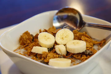 Raisin Bran with Bananas and Milk