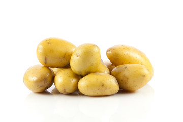 Fresh potatoes on a white background.