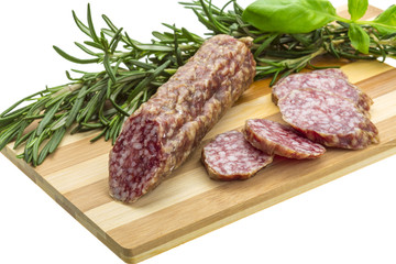Salami with rosemary, basil