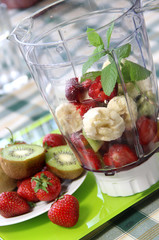 Fresh fruits in the blender