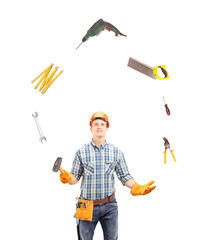 Manual worker juggling with tools