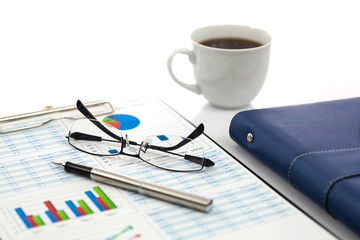 Business report with cup of coffee