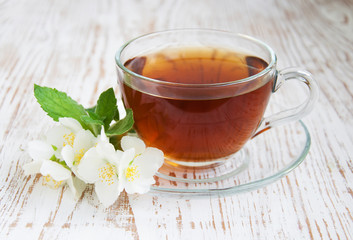 Tea and jasmine flowers