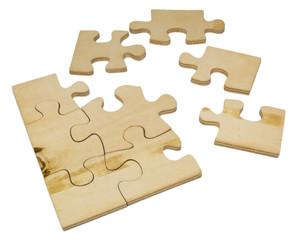 Wooden puzzle on white background.