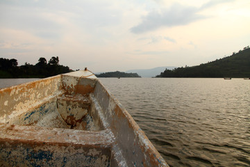 Peeling Boat Reaches Into a Lake