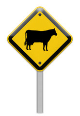 Cow warning sign on roadside