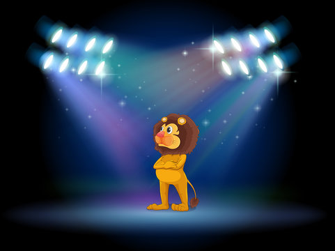 A lion standing in the middle of the stage