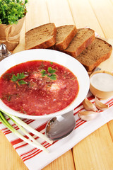 Delicious borsch on table close-up