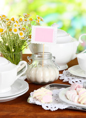 Table setting with chamomiles