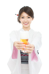 Beautiful young woman wearing japanese traditional kimono