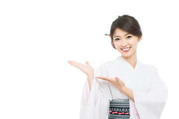 Beautiful young woman wearing japanese traditional kimono