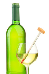 Bottle and glass of wine with thermometer, isolated on white