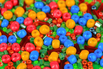 Fototapeta na wymiar Different colorful beads close-up