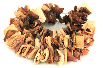 Dried mushrooms on string isolated on white