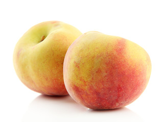 Fototapeta na wymiar Ripe sweet peaches, isolated on white