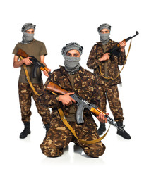 Arabs with automatic gun on white background
