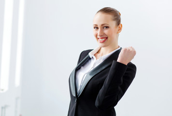 Attractive businesswoman in black suit
