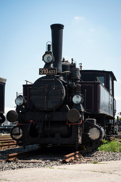 Front view of vintage steam locomotive