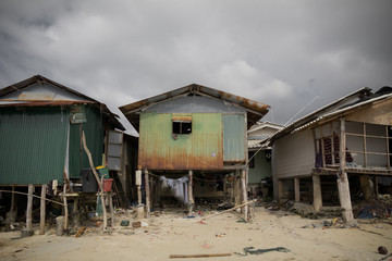 Poor fishers houses along sea coast, Koh Samui, Thailand