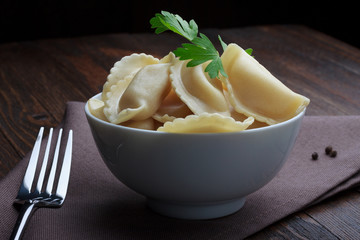 Steamed meat dumplings, traditional pelmeni or varenyky dish