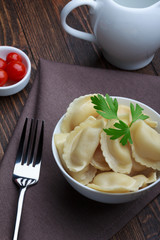 Steamed meat dumplings, traditional pelmeni or varenyky dish