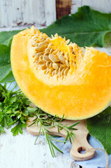 .A piece of pumpkin and aromatic herbs