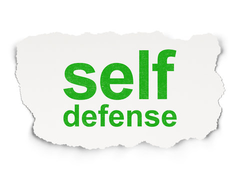 Safety concept: Self Defense on Paper background