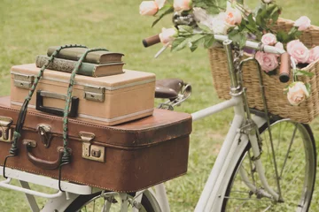 Printed kitchen splashbacks Bike Vintage bicycle on the field with a basket of flowers and bag