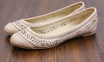 A pair of casual shoe on floor