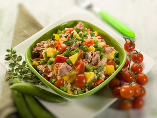 cold rice salad with tuna and pineapple, selective focus