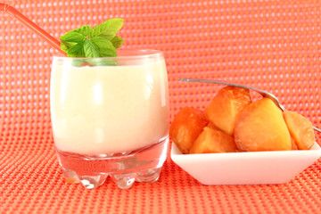 papaya smoothie in red background