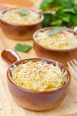 Baked chicken with mashed cauliflower and cheese close-up