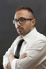 SERIOUS MAN CROSSES ARMS