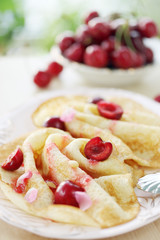 pancakes with cherry and pine nuts