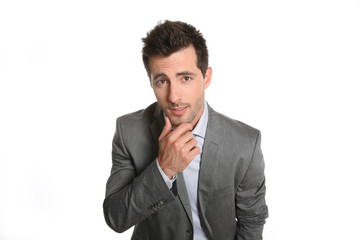 Portrait of businessman listening carefully