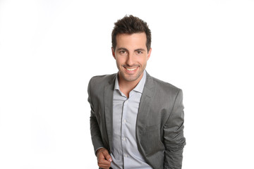 Successful businessman standing on white background